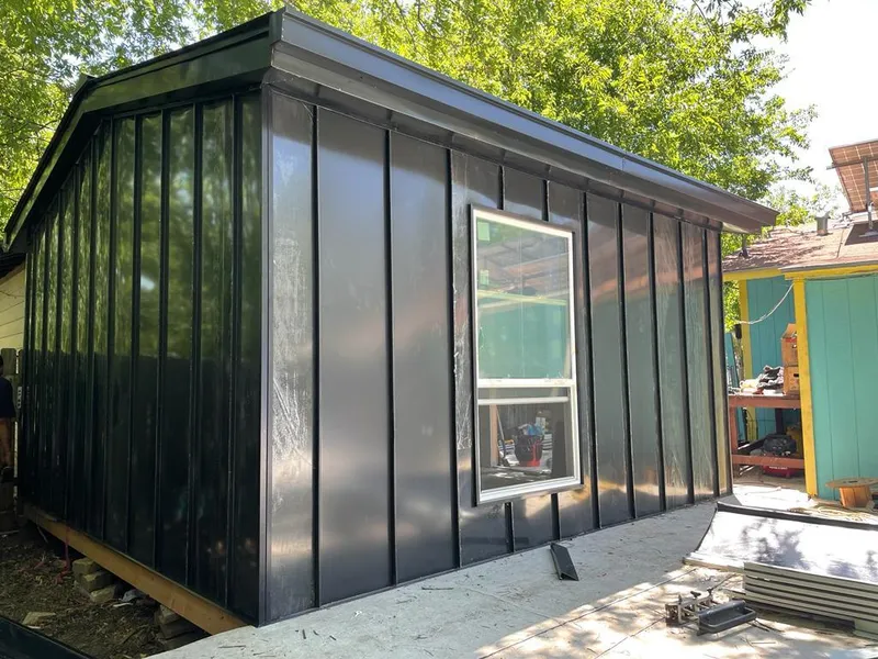 Black standing seam metal wall panels for Roof Inspection in Bethany